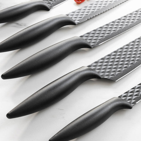 Set de 6 pièces comprenant un éplucheur à légumes - 5X couteaux de